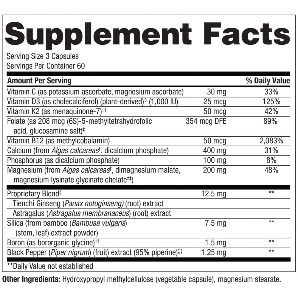 A close-up of a supplement facts label showing serving size 3 capsules, daily value percentages, and a list of ingredients including Vitamin B3, Vitamin B12, Tienqi Ginseng, Silicon, Boron, and Black Pepper.